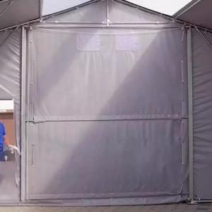 Professzionális ponyvacsarnok, raktársátor ipari sátor 5 × 10 m, 50 m² alapterülettel, 4,00 m oldalmagassággal, felhúzható kapuval, személyi bejárattal  szürke, lángálló PRIMEtex ponyvával