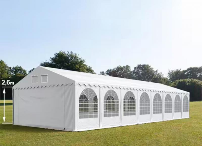 Professzionális extra erős rendezvény- és partisátor 6 × 16 m, 96 m², PVC ponyvával, 2,60 m oldalmagassággal, megerősített horganyzott acélszerkezettel és padlókerettel – fehér