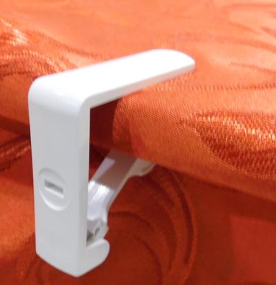 Terítőlefogató rugós