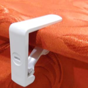 Terítőlefogató rugós