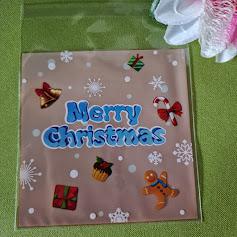 DCS132 - Karácsonyi mintás mikulás tasak - narancs hátuljú/Merry Christmas felíratú 10x13cm