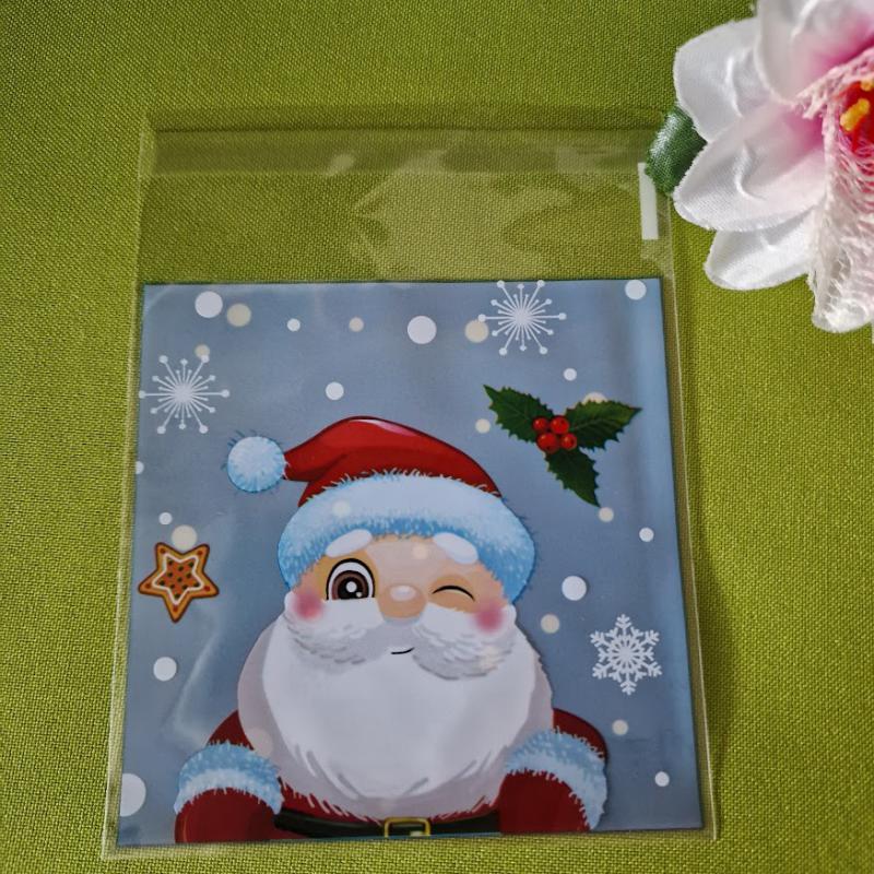 DCS134 - Karácsonyi mintás mikulás tasak - kék hátuljú/ Télapó 10x13cm