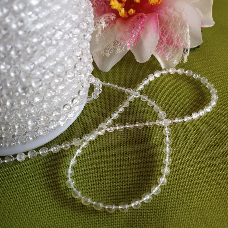 DEK04 - 3mm-es kristály színű gyöngyök zsinóron