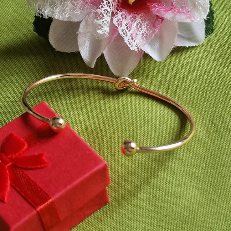 KAR79 - Arany színű nyitott acél Karkötő