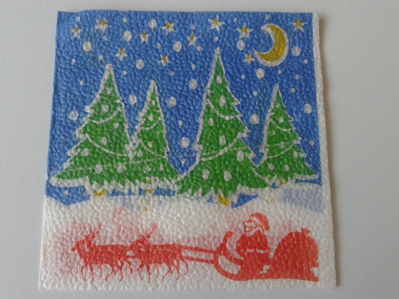 SZV107 Dekoupage - Hóesés, mikulás rénszarvas szánon, fenyőfák, kékség 1 rétegű szalvéta