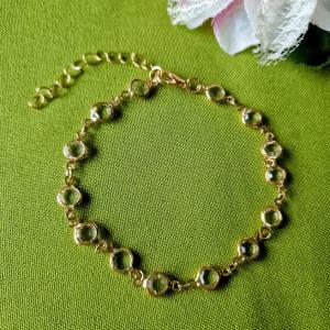 KAR82 - Arany színű Karkötő, karlánc gyöngyök foglalatban