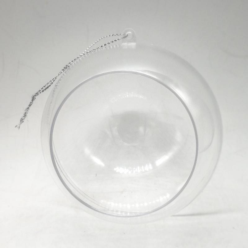 Átlátszó akril gömb, elején kör alakú nyílással. Mérete: 14 cm