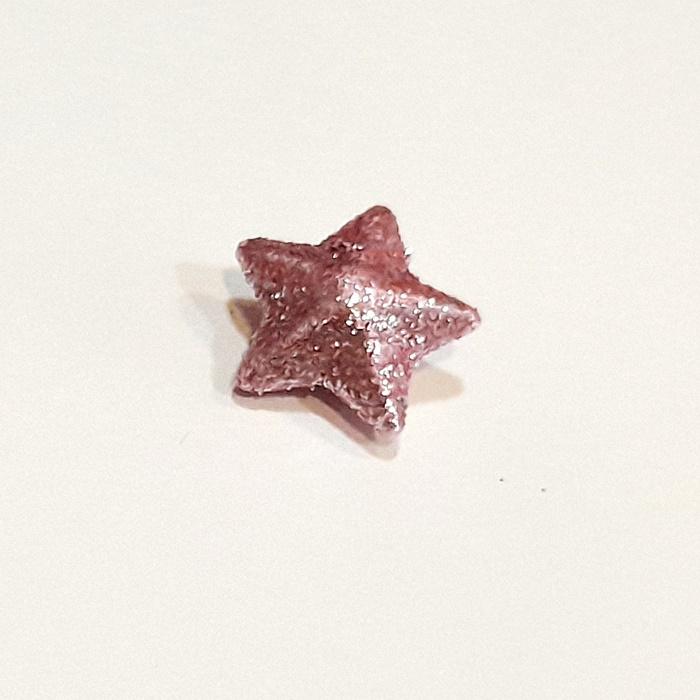 Polisztirol csillag, csillámos, rózsaszin. Mérete: 20 mm