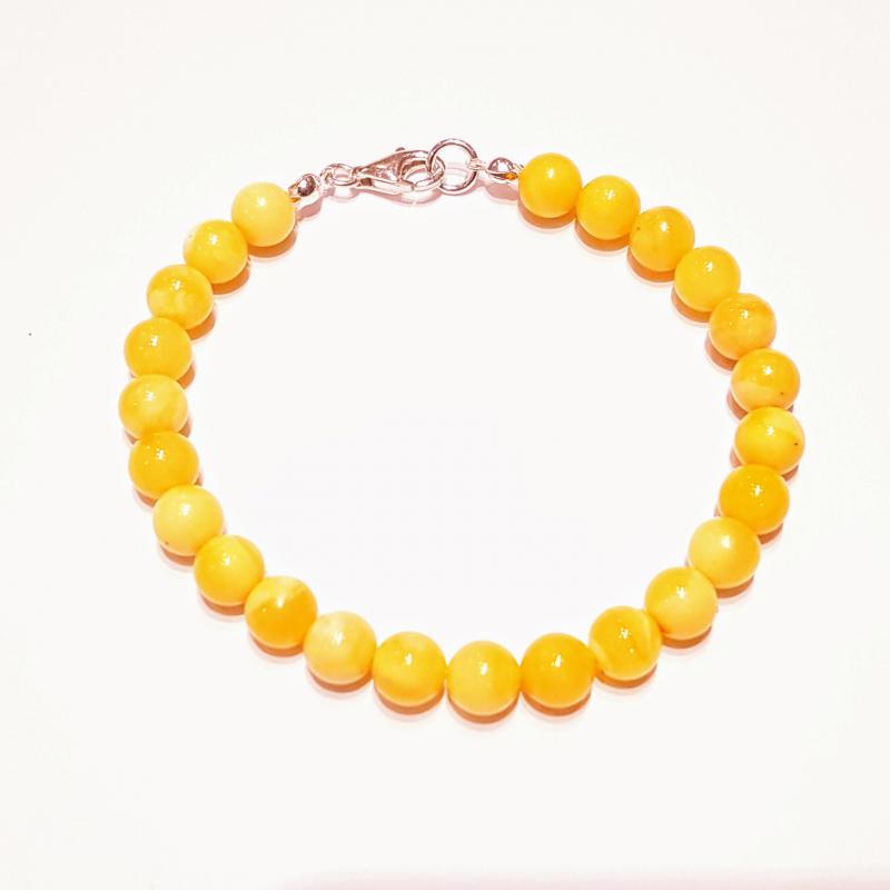 Borostyán gömb karkötő sárga opak Jubilex (7mm)704