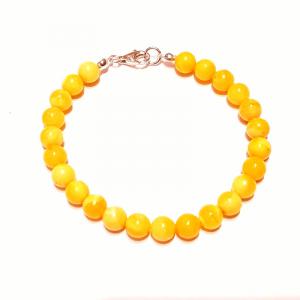 Borostyán gömb karkötő sárga opak Jubilex (8mm) 554