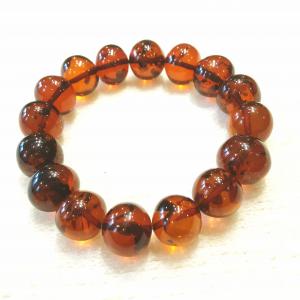 Borostyán karkötő sötét gumis Jubilex 586