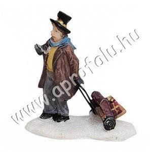 Hölgy gurulós bőrönddel